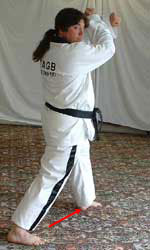 Move left leg out to prepare for walking stance