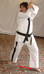 Move left leg out to prepare for walking stance